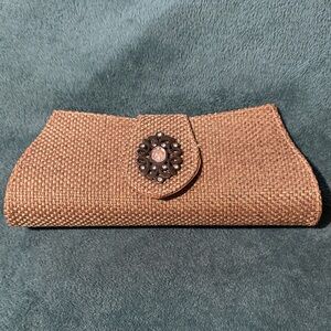 Elegant Tan Clutch with Embellished Clasp